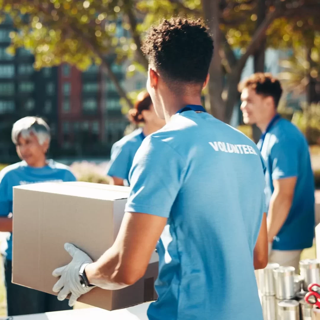 box-volunteer-team-outdoor-donation-help-back-community-care-ngo-group-man-charity-service-with-package-distribution-food-drive-humanitarian-aid-with-poverty-suppliesjpg-6a2943ad7161b